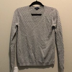 Grey light knit sweater.